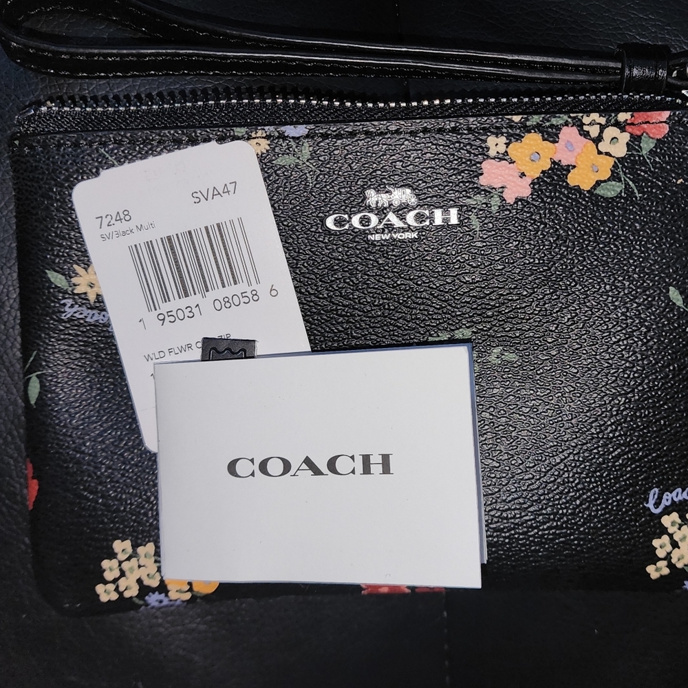 Coach Small Wristlet In Signature Canvas